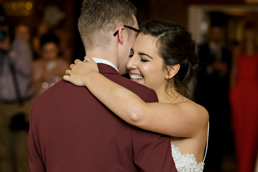 A married couple's first dance at their wedding reception.